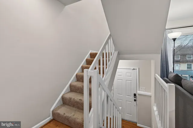 a view of a hallway with a window