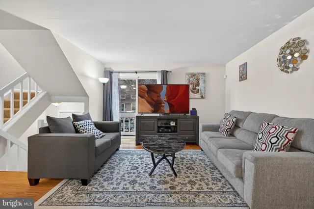 a living room with furniture and a couch