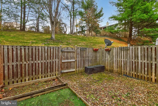 a view of a wooden fence