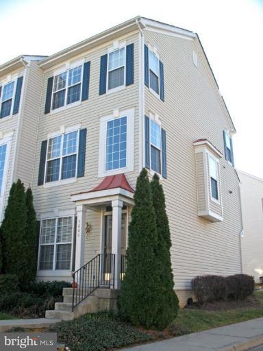 5866 Summers Grove Road Alexandria, VA 22304 - Photo 2 of 19 a front view of a house with a yard