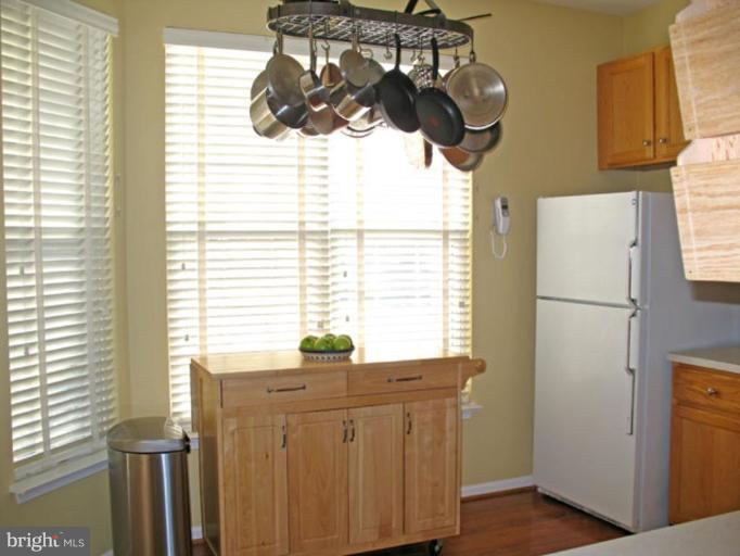 5866 Summers Grove Road Alexandria, VA 22304 - Photo 11 of 19 a bathroom with a sink and a window