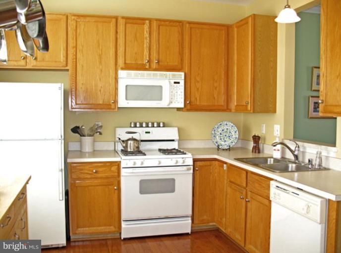 5866 Summers Grove Road Alexandria, VA 22304 - Photo 12 of 19 a view of a kitchen with sink and cabinets