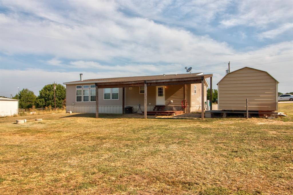 7575 Honey Creek Road Celina, TX 75009 - Photo 29 of 39 Back of home and shed