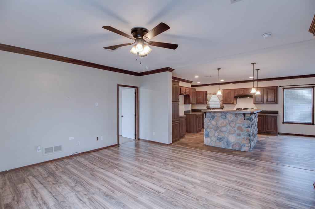 7575 Honey Creek Road Celina, TX 75009 - Photo 9 of 39 Open concept to the kitchen