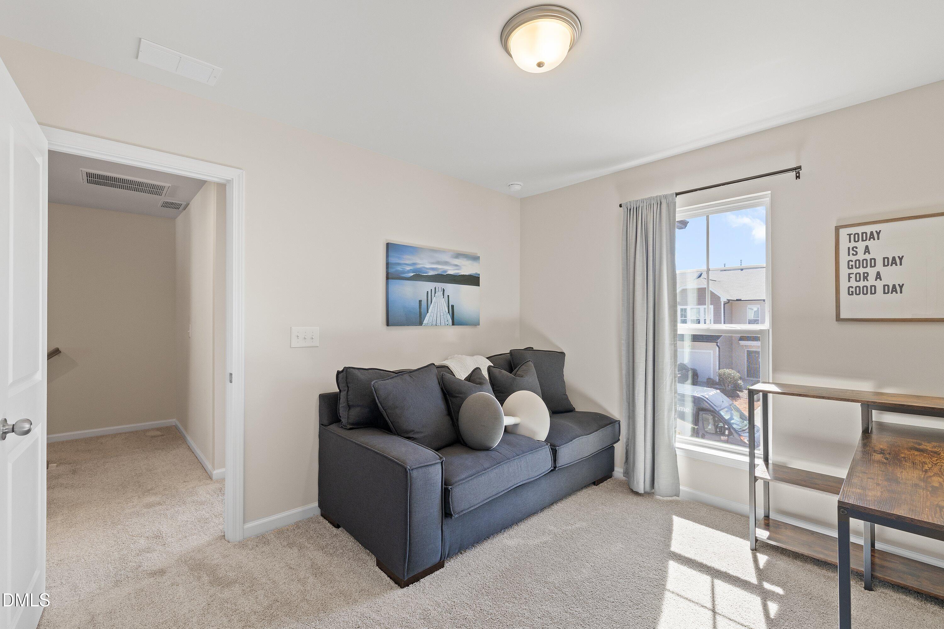 1004 Everglades Way Durham, NC 27713 - Photo 26 of 40 a living room with furniture