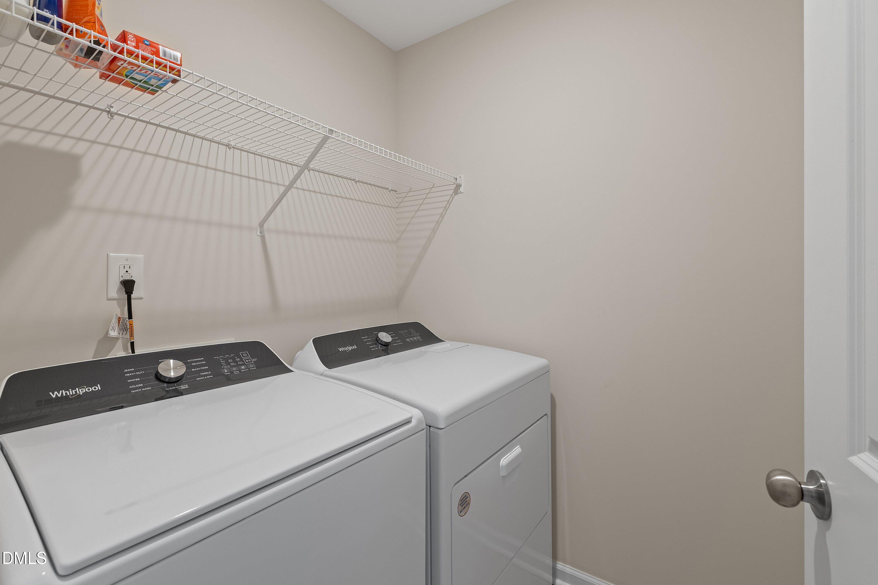 1004 Everglades Way Durham, NC 27713 - Photo 28 of 40 a utility room with dryer and washer