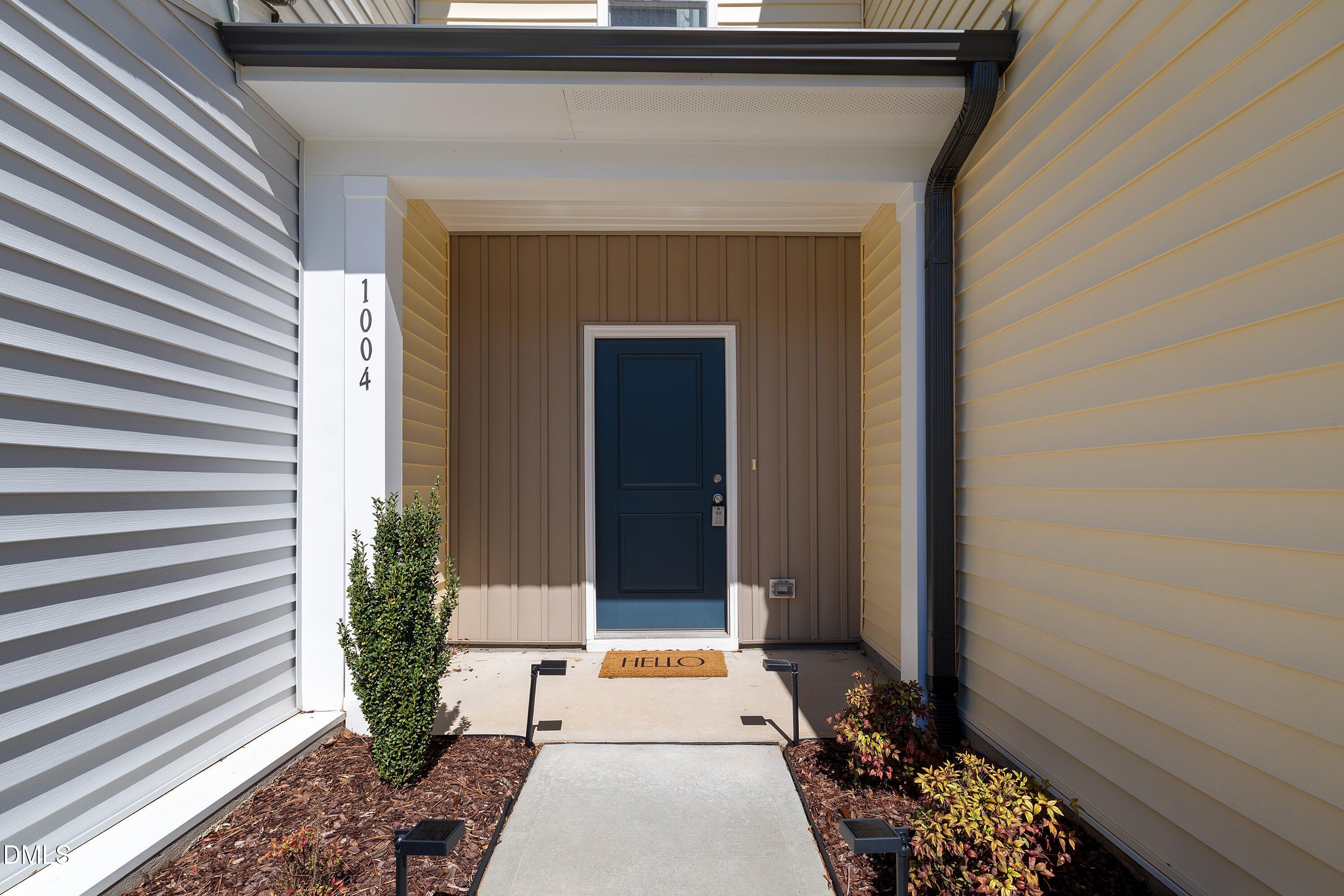 1004 Everglades Way Durham, NC 27713 - Photo 5 of 40 a view of a entryway door front of house