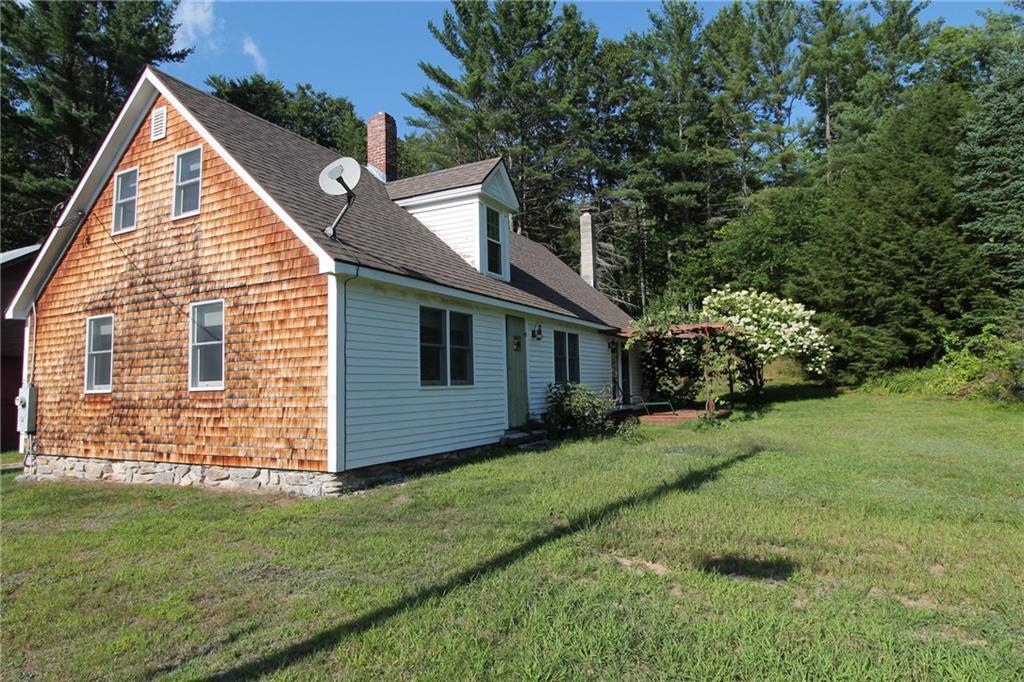 205 Intervale Road Bethel, ME 04217 - Photo 1 of 21 Side of house with small deck off of...