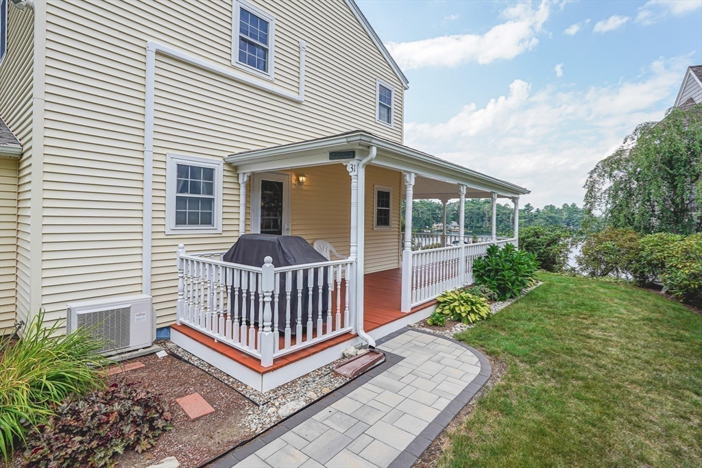31 Bay View Road Webster, MA 01570 - Photo 5 of 42 a front view of a house with porch