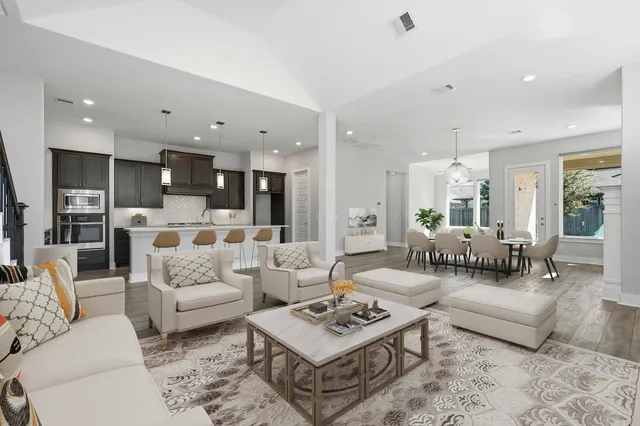 a spacious bathroom with a bathtub and shower