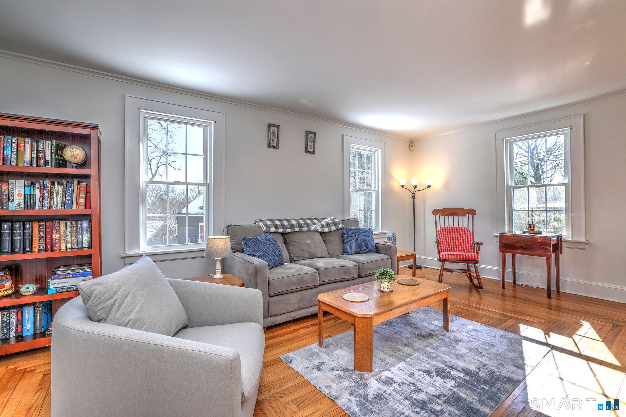 3 Wheeler Drive Trumbull, CT 06611 - Photo 20 of 32 a living room with furniture a rug and a window