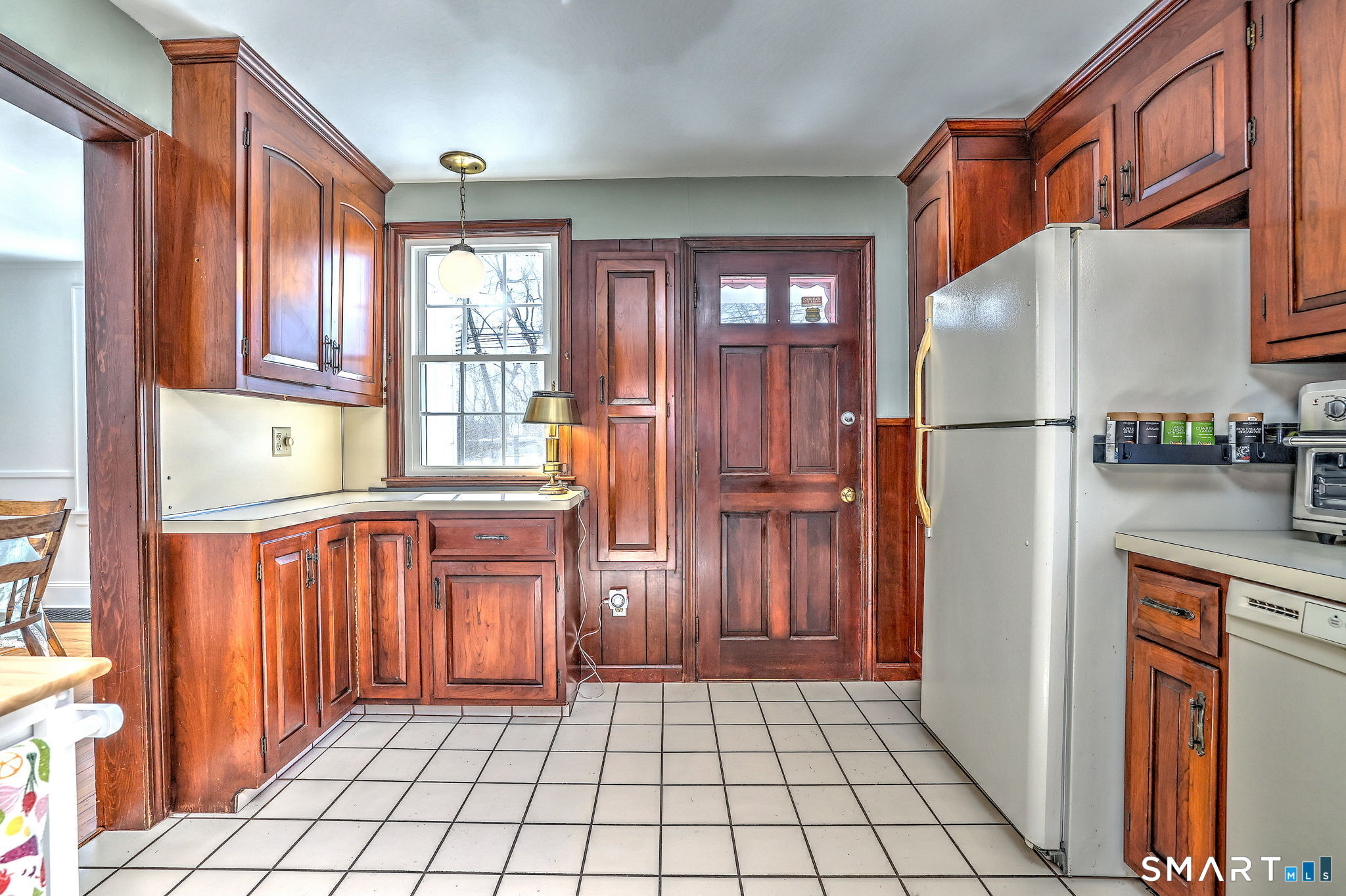 3 Wheeler Drive Trumbull, CT 06611 - Photo 27 of 32 a kitchen with stainless steel appliances granite countertop a refrigerator and a sink