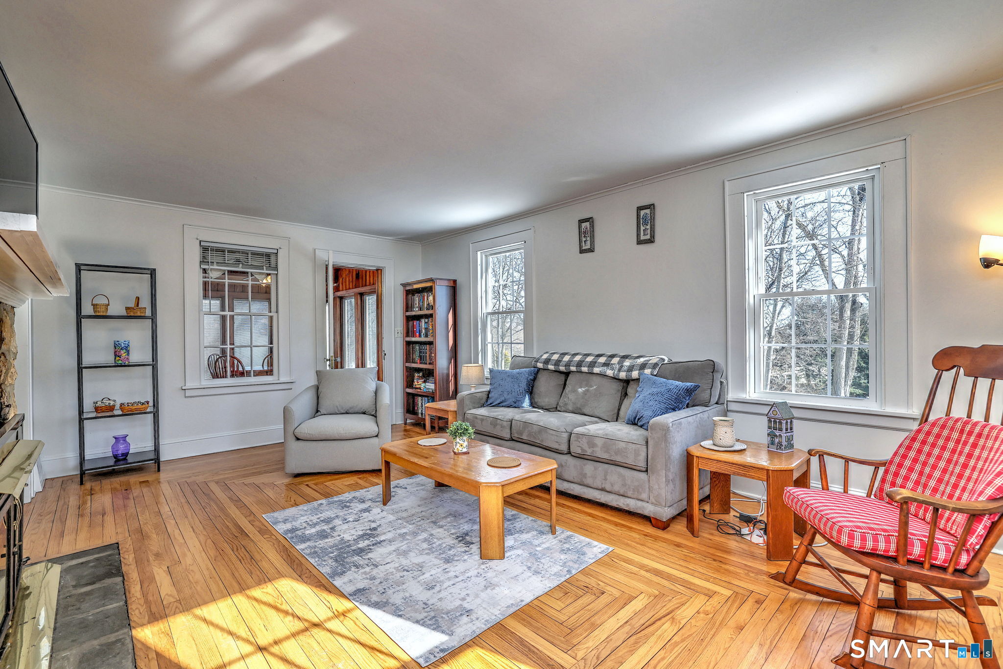 3 Wheeler Drive Trumbull, CT 06611 - Photo 5 of 32 a living room with furniture and a wooden floor