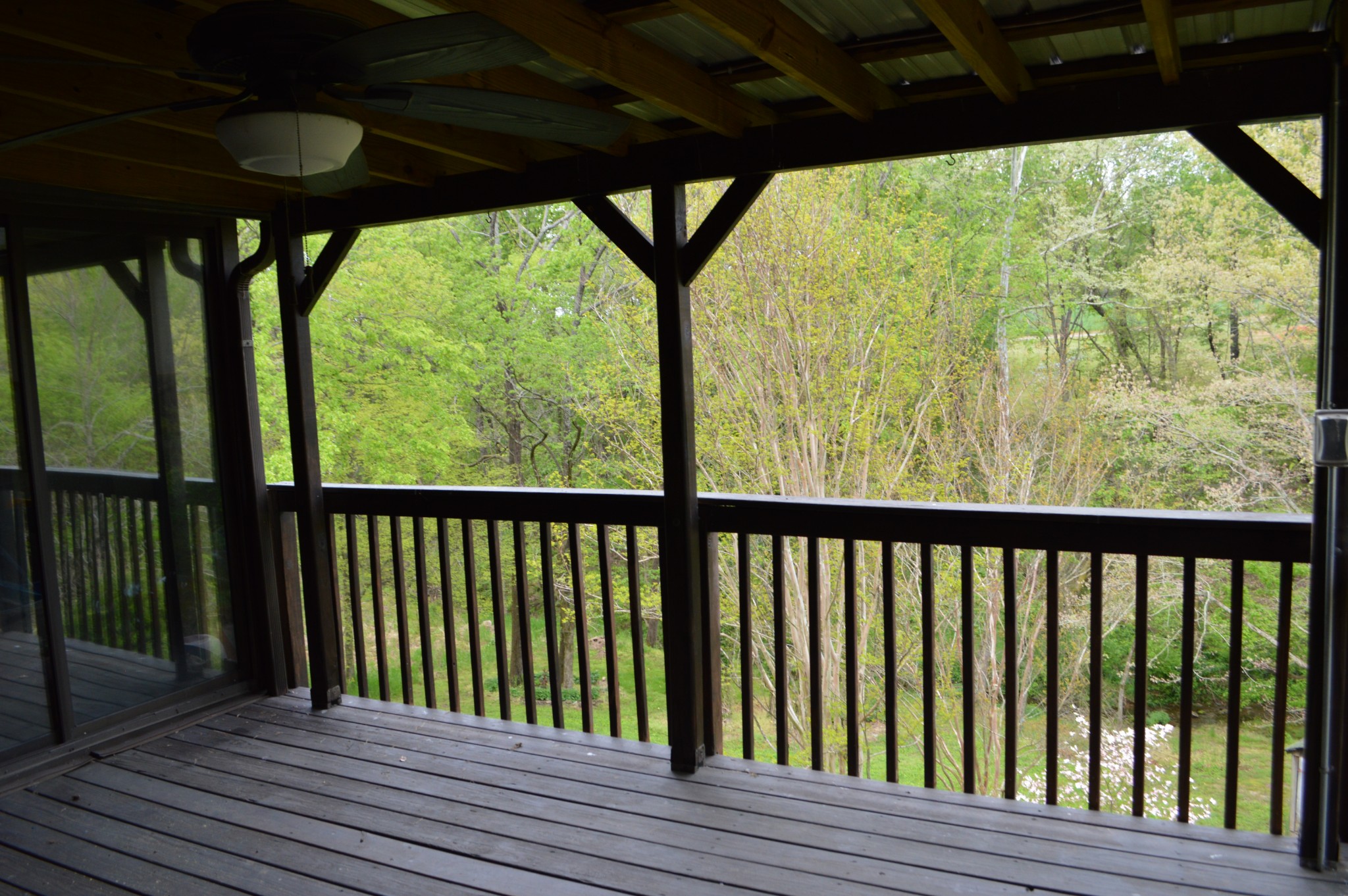 4457 Airport Road Springfield, TN 37172 - Photo 4 of 6 a view of balcony with wooden floor