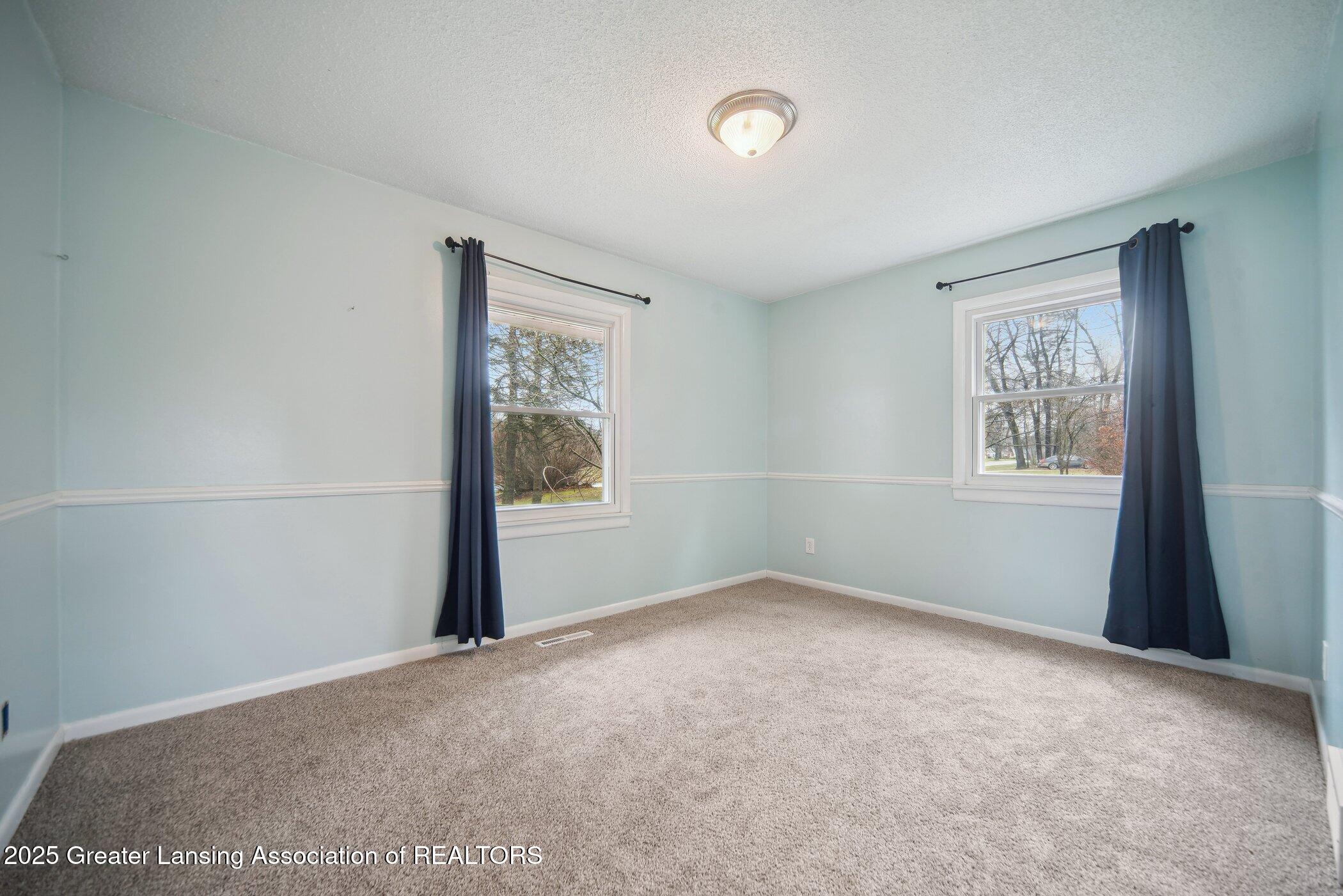 5767 Green Road Haslett, MI 48840 - Photo 10 of 12 5767-Green-Rd-Haslett-MI-48840-WindowSti