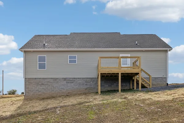 a front view of a house with garage
