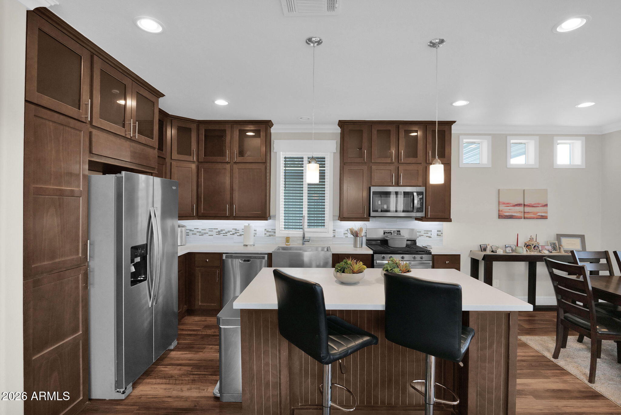 3300 East Broadway Road, Unit 252 Mesa, AZ 85204 - Photo 14 of 35 a large kitchen with a table and chairs