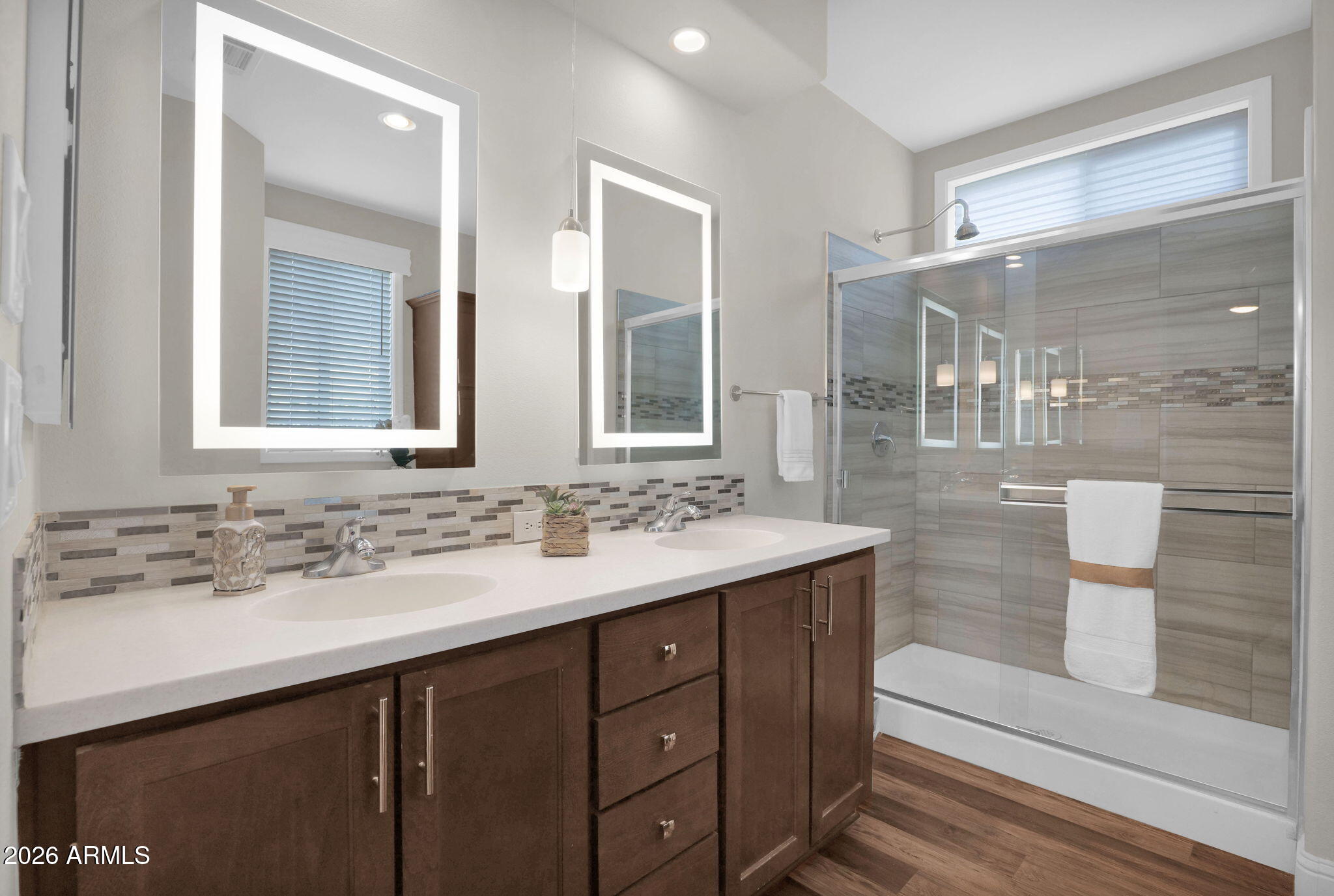 3300 East Broadway Road, Unit 252 Mesa, AZ 85204 - Photo 25 of 35 a bathroom with a sink and a mirror