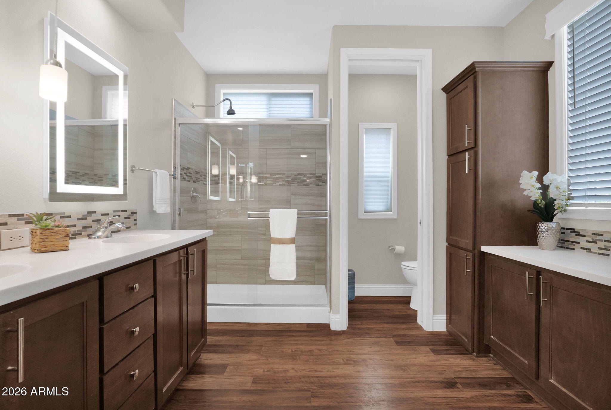 3300 East Broadway Road, Unit 252 Mesa, AZ 85204 - Photo 27 of 35 a bathroom with a sink and a mirror