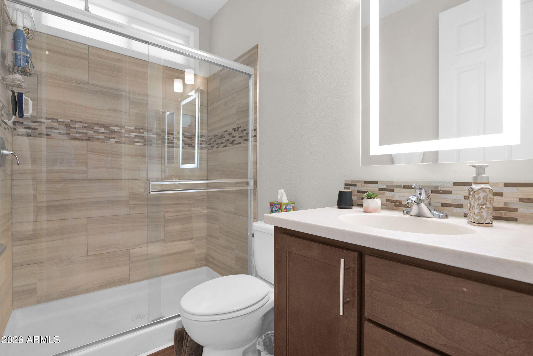 3300 East Broadway Road, Unit 252 Mesa, AZ 85204 - Photo 31 of 35 a bathroom with a sink a toilet and shower