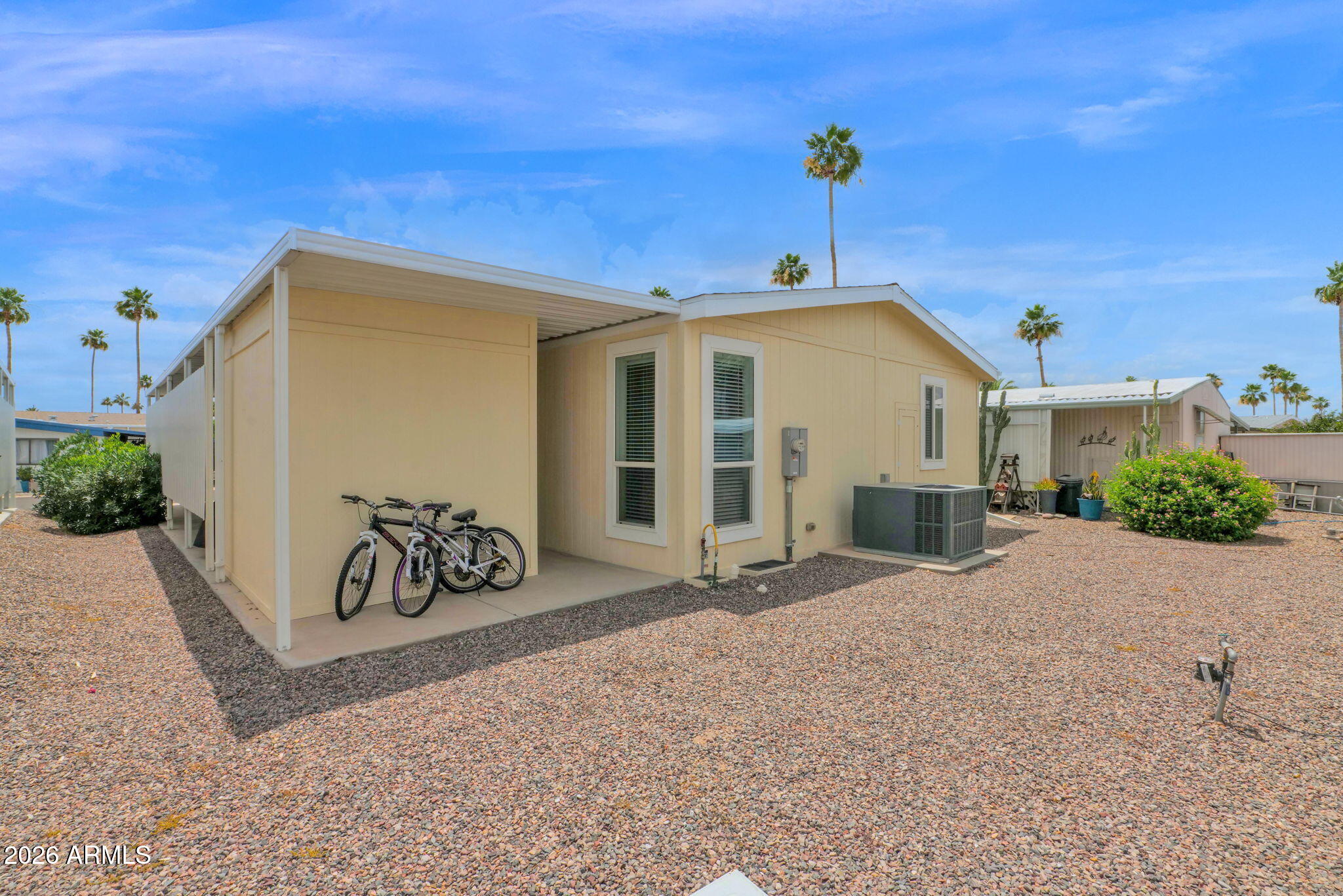 3300 East Broadway Road, Unit 252 Mesa, AZ 85204 - Photo 34 of 35 a front view of a house with porch