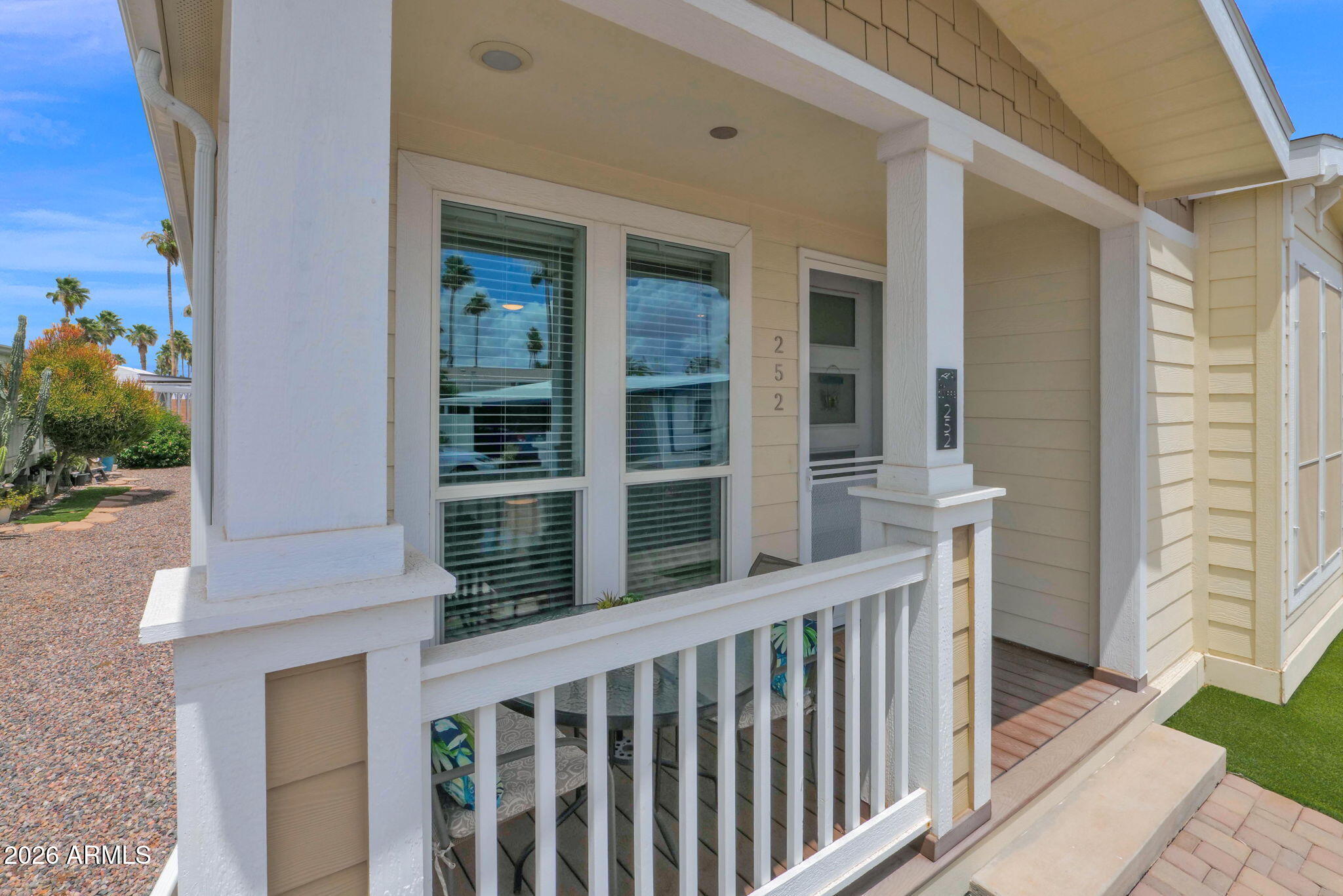 3300 East Broadway Road, Unit 252 Mesa, AZ 85204 - Photo 4 of 35 a view of a balcony with front door