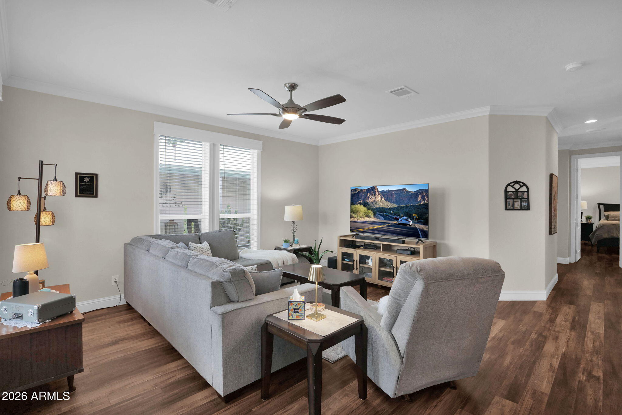 3300 East Broadway Road, Unit 252 Mesa, AZ 85204 - Photo 7 of 35 a living room with furniture and a flat screen tv