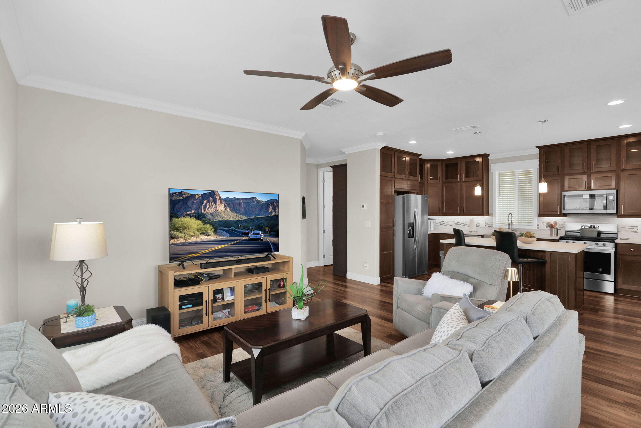 3300 East Broadway Road, Unit 252 Mesa, AZ 85204 - Photo 9 of 35 a living room with furniture and a flat screen tv