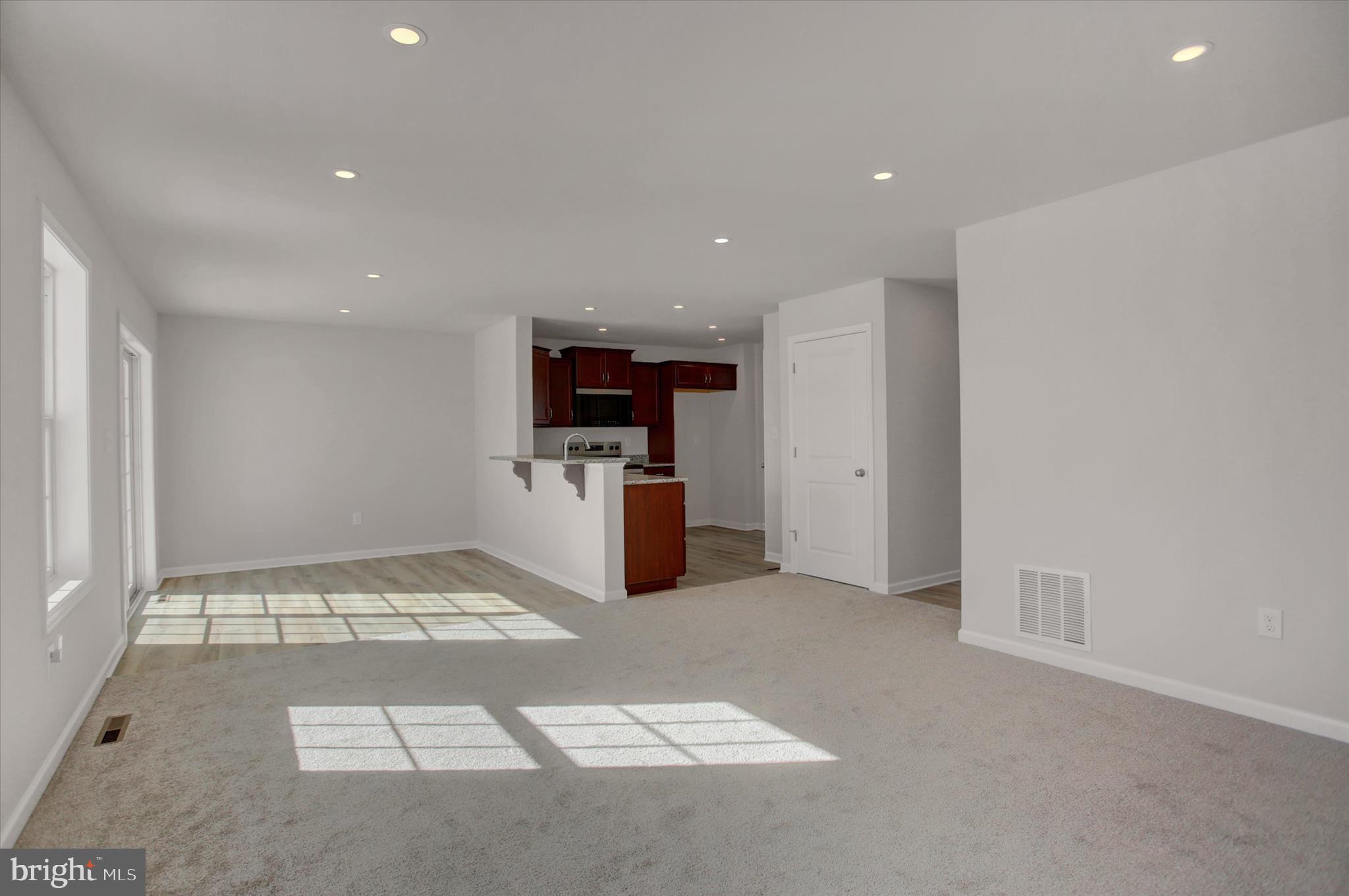 601 Exeter Lane Shippensburg, PA 17257 - Photo 20 of 48 a view of kitchen with refrigerator and microwave