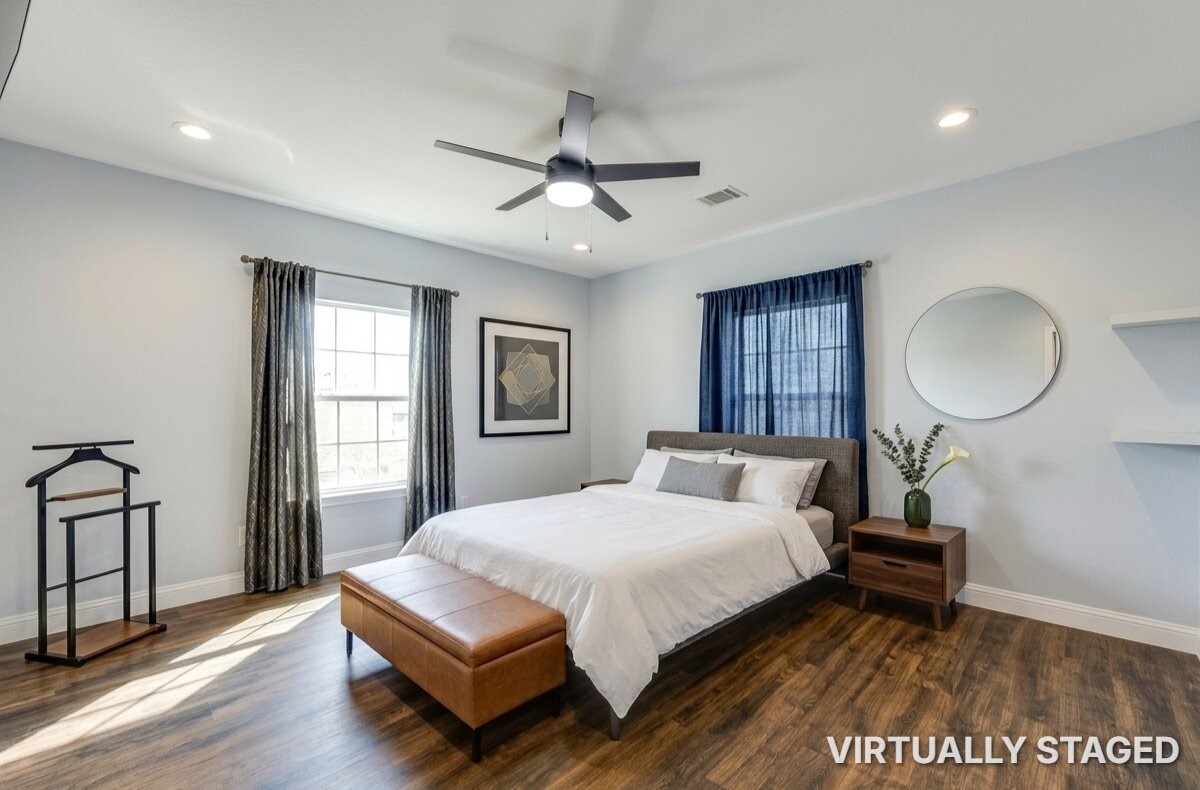 8570 Sunny Side Road Hempstead, TX 77445 - Photo 22 of 48 a bedroom with a large bed and a window