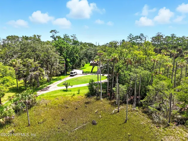 a view of a golf course with a lake