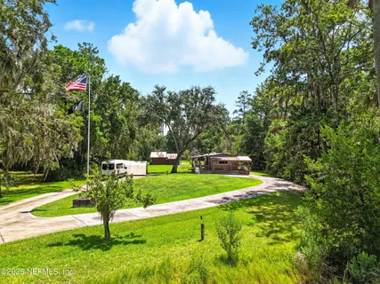 a view of a golf course with a lake