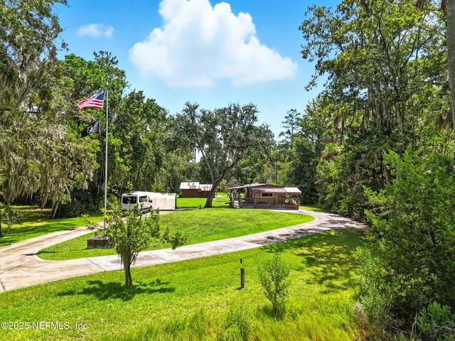a view of a golf course with a lake