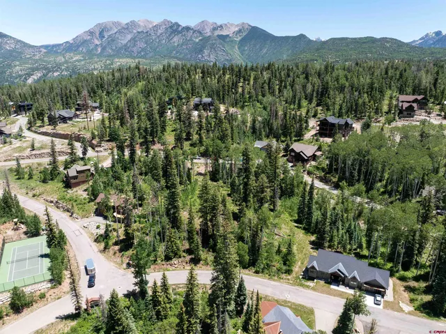 an aerial view of a city with lots of residential buildings