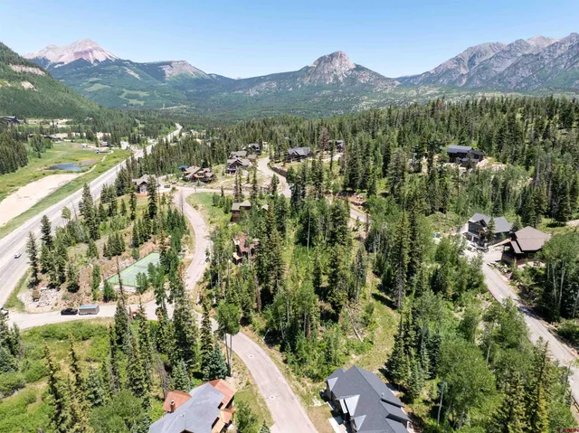 a view of a city with a mountain