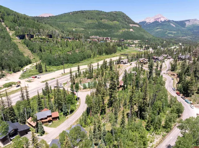 a view of a city with a lake