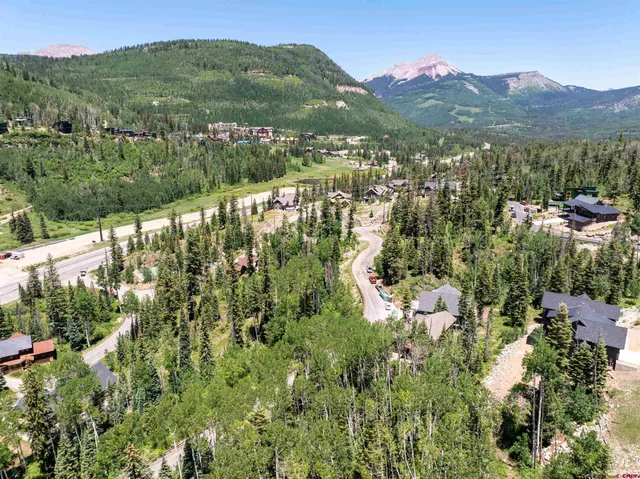 a view of a city with a lake