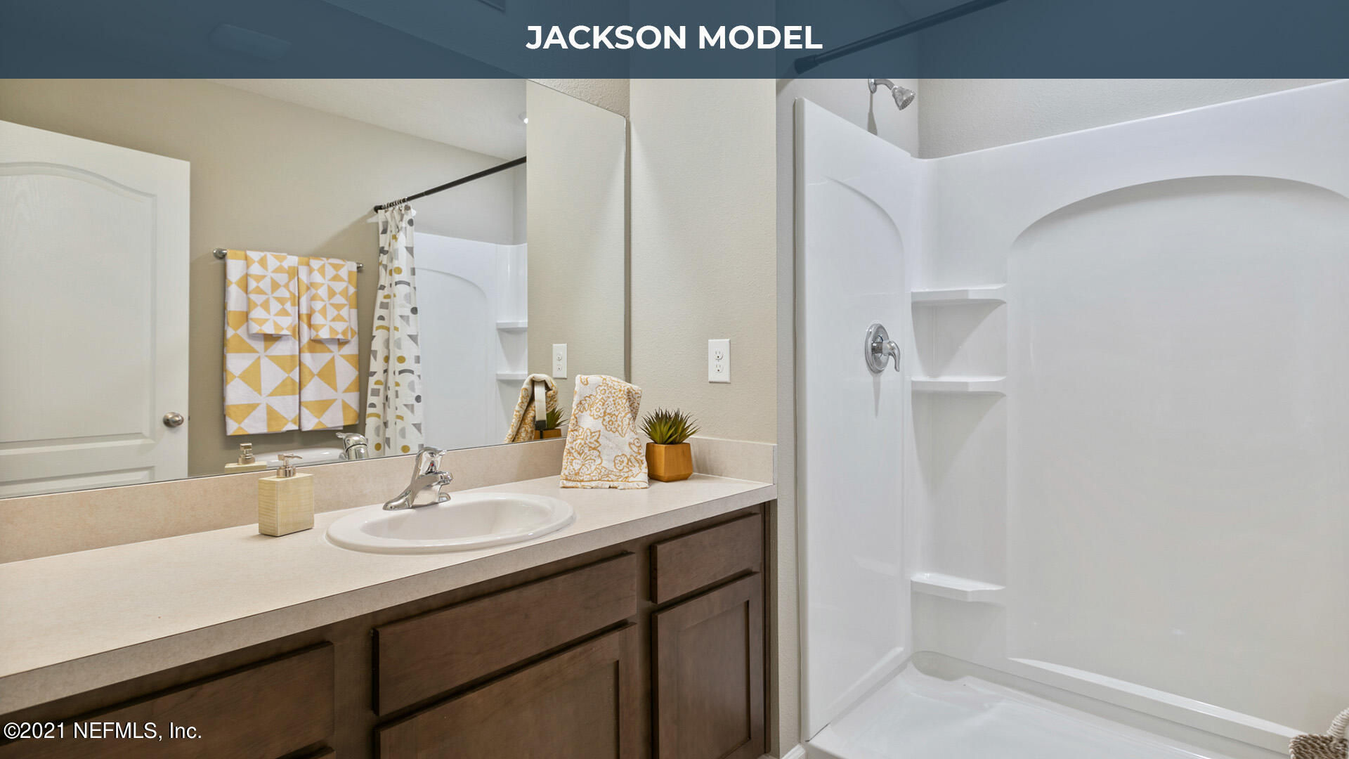 950 Rotary Road Jacksonville, FL 32211 - Photo 8 of 13 a bathroom with a sink and a mirror