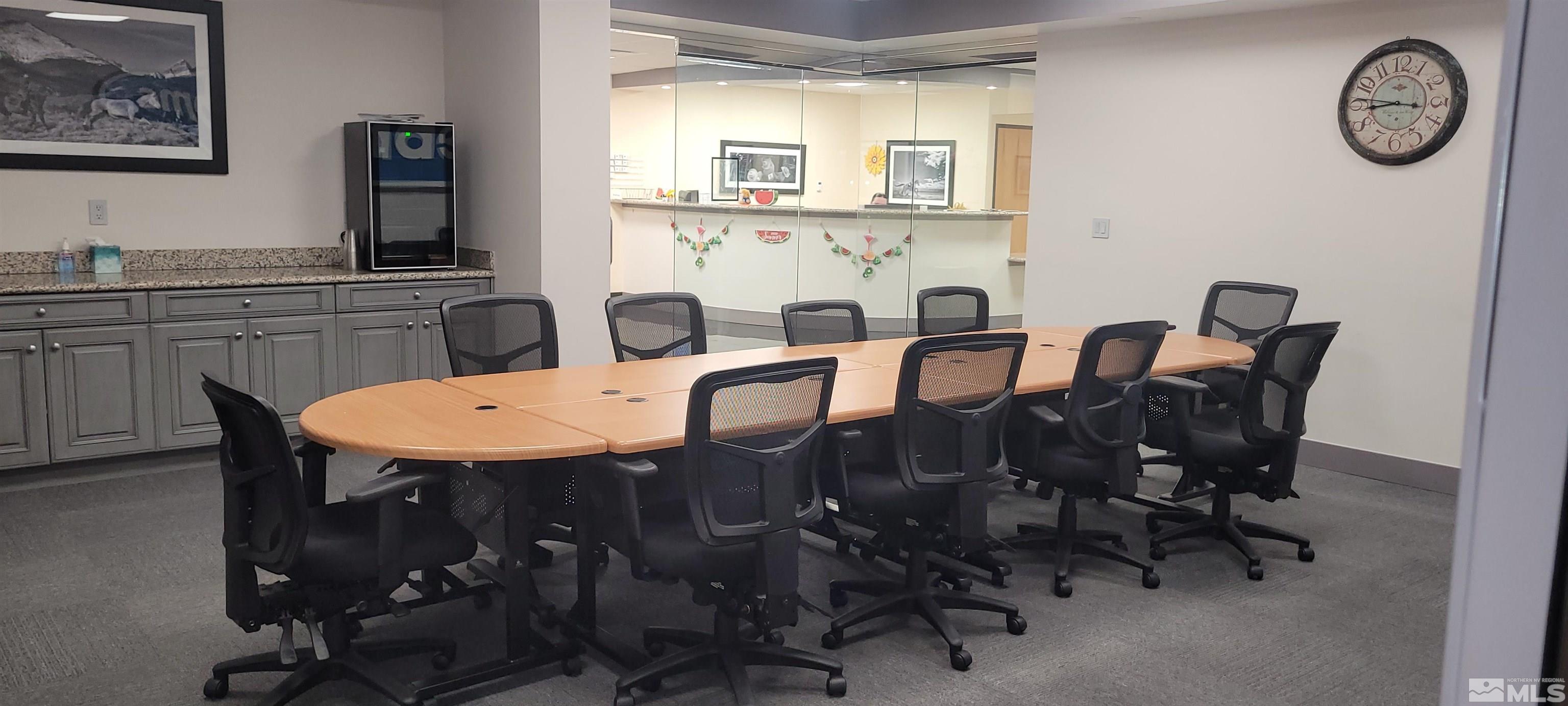5011 Meadowood Mall Way, Unit 200 Reno, NV 89502 - Photo 4 of 5 a view of a dining room with furniture
