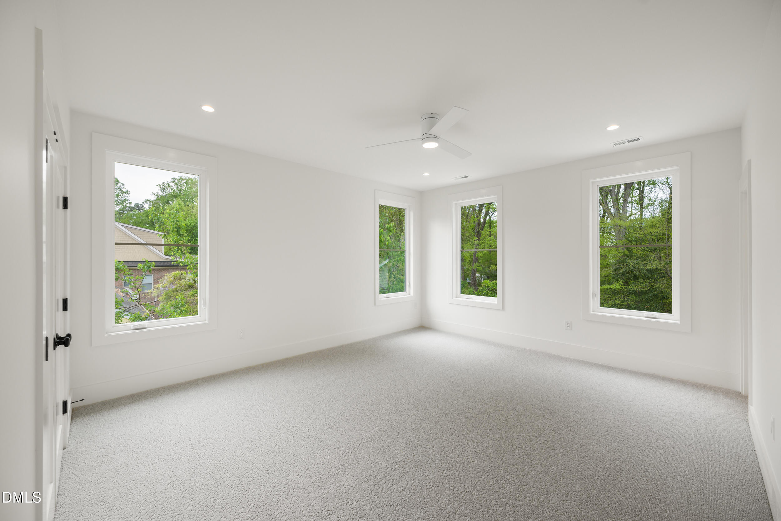 2817 Claremont Road Raleigh, NC 27608 - Photo 56 of 73 an empty room with windows and closet