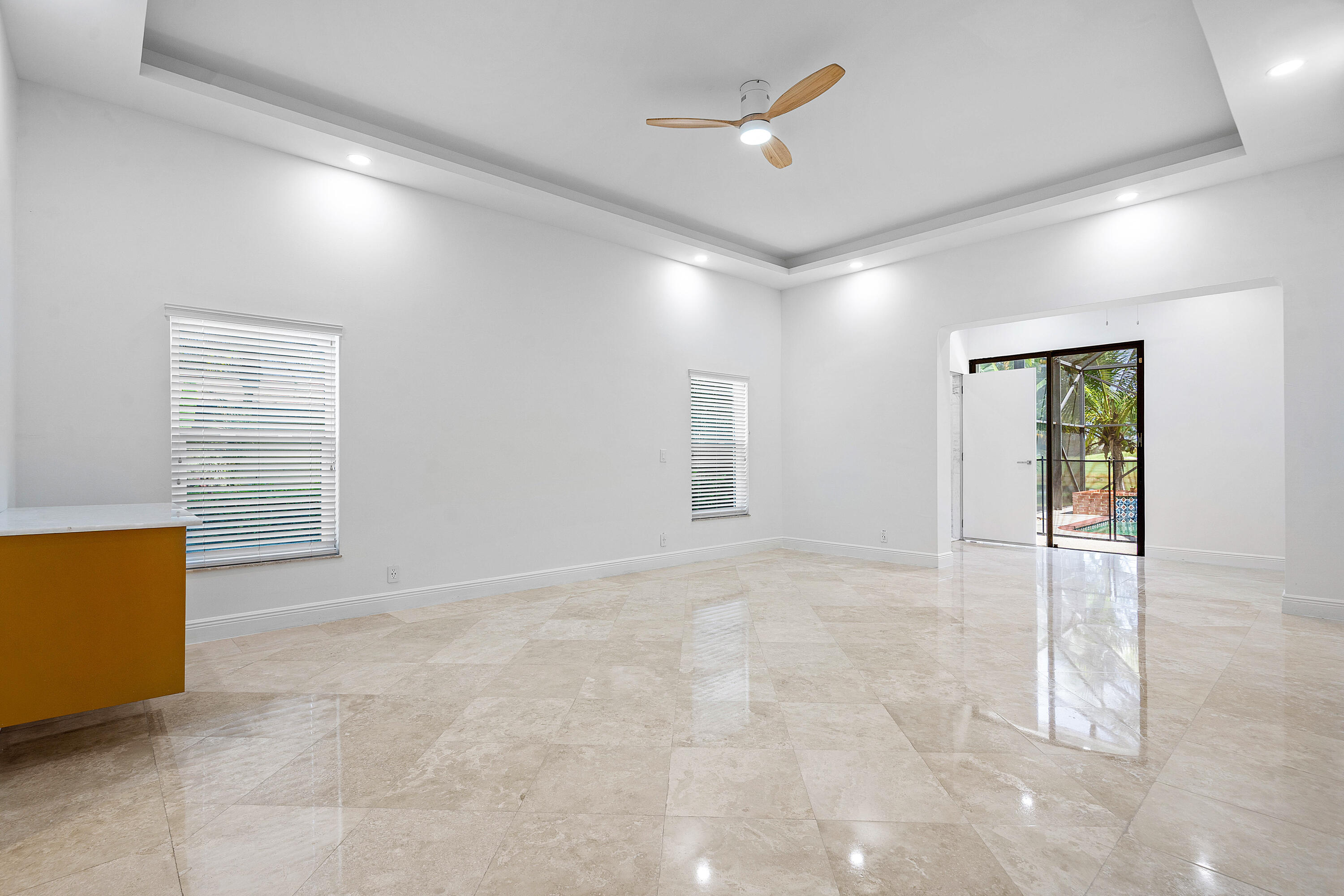 10391 Boca Woods Lane Boca Raton, FL 33428 - Photo 14 of 60 an empty room with windows