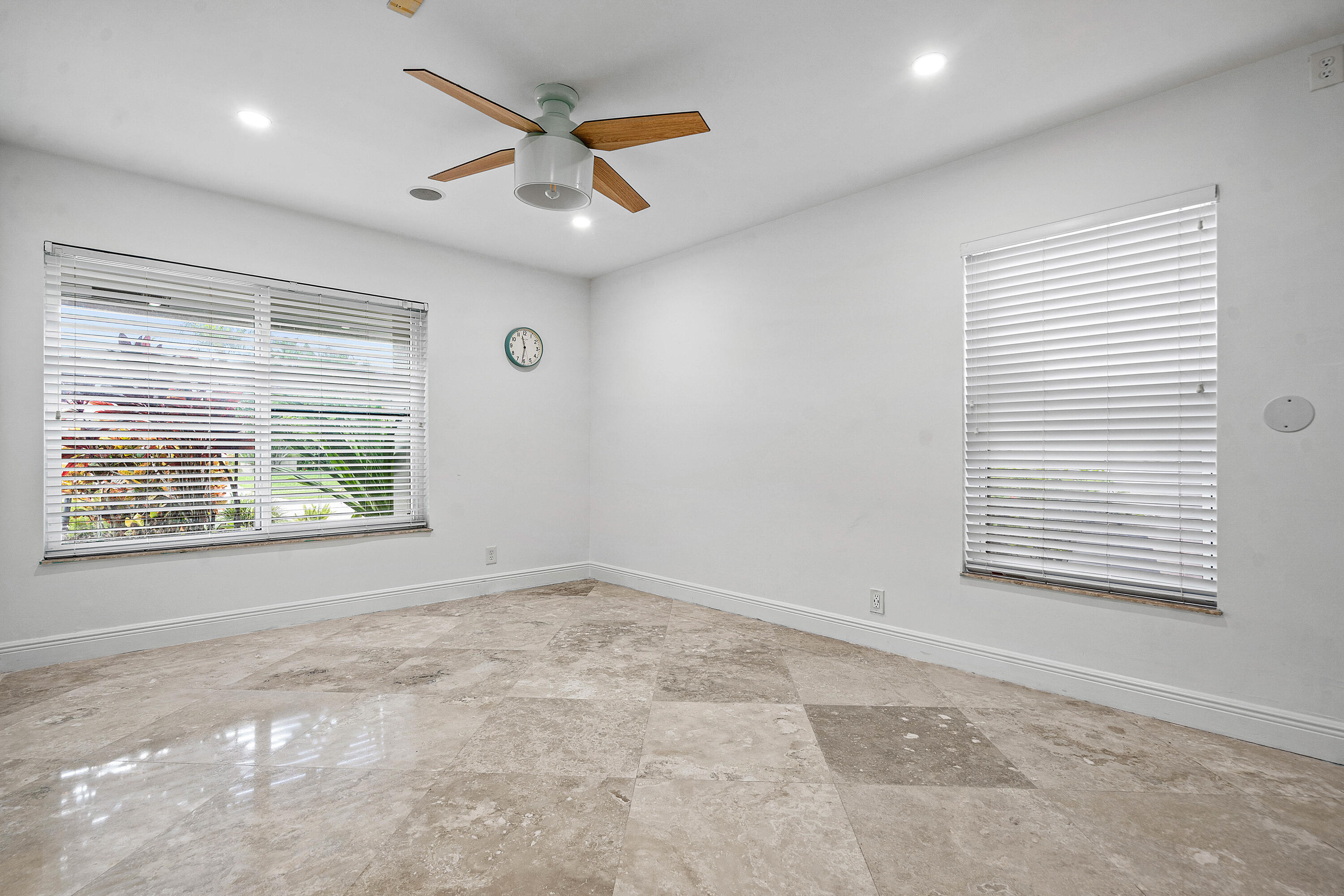 10391 Boca Woods Lane Boca Raton, FL 33428 - Photo 23 of 60 a view of an empty room with a window