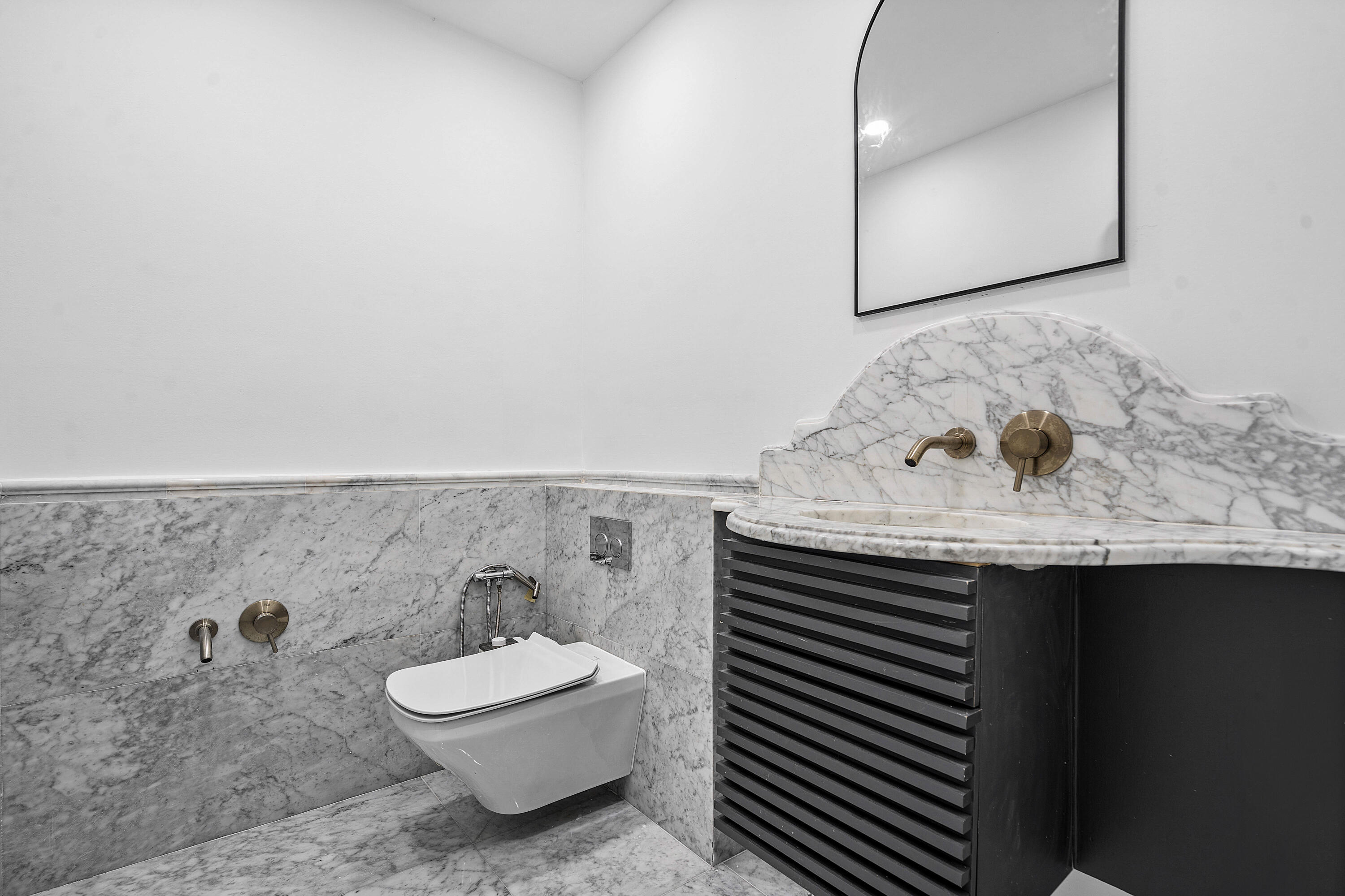 10391 Boca Woods Lane Boca Raton, FL 33428 - Photo 26 of 60 a bathroom with a sink and a mirror