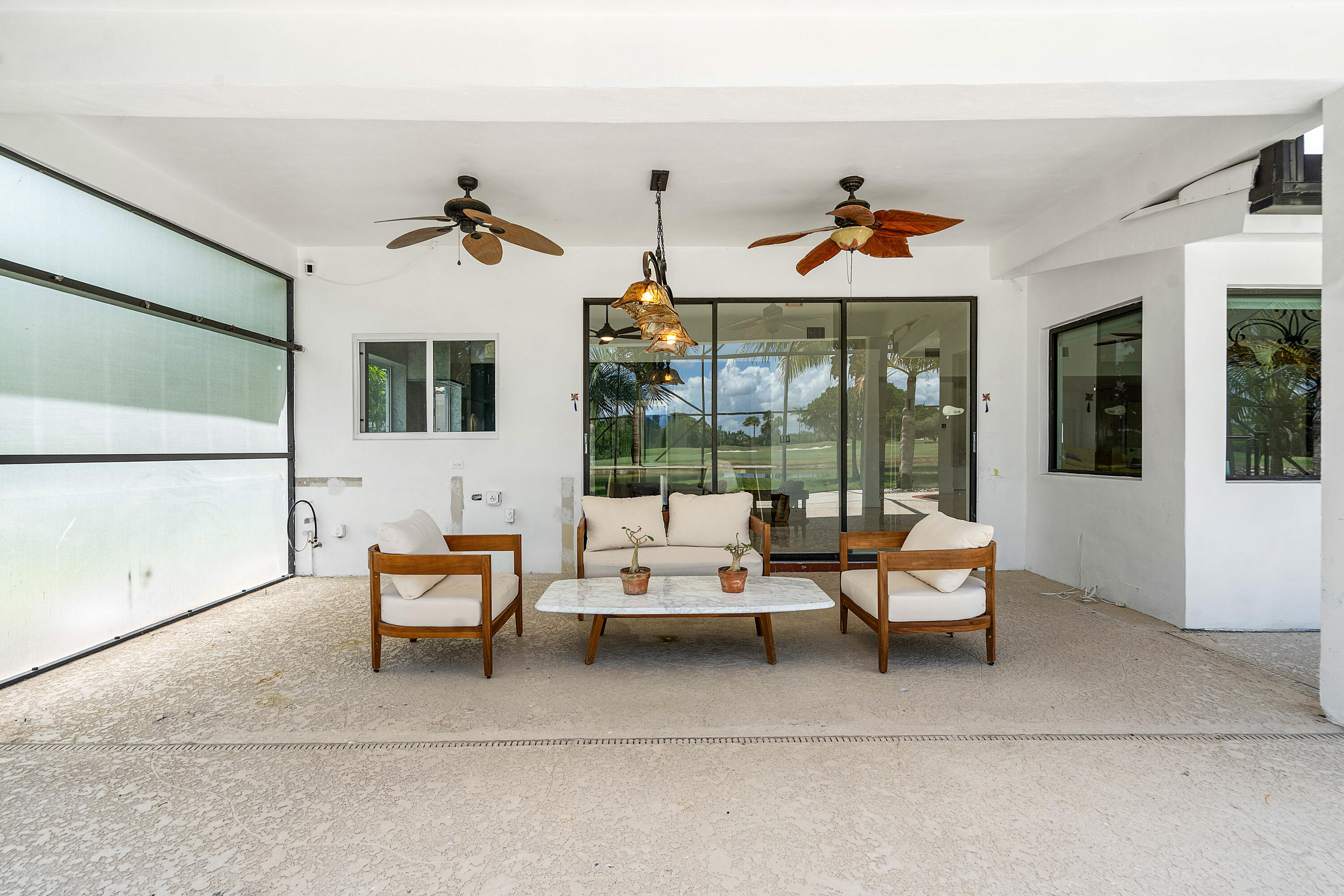 10391 Boca Woods Lane Boca Raton, FL 33428 - Photo 31 of 60 a outdoor space with lots of tables and chairs