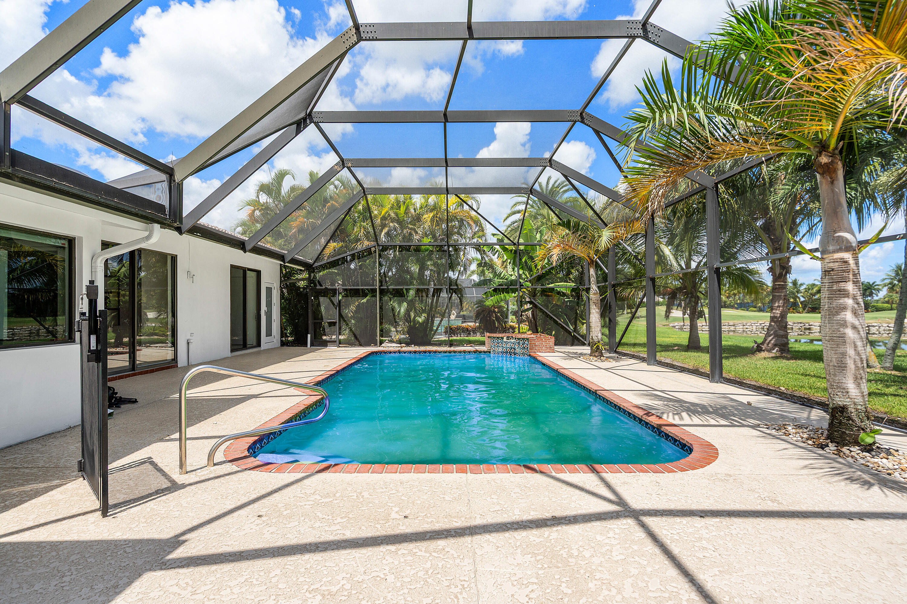 10391 Boca Woods Lane Boca Raton, FL 33428 - Photo 33 of 60 a view of a backyard with a patio