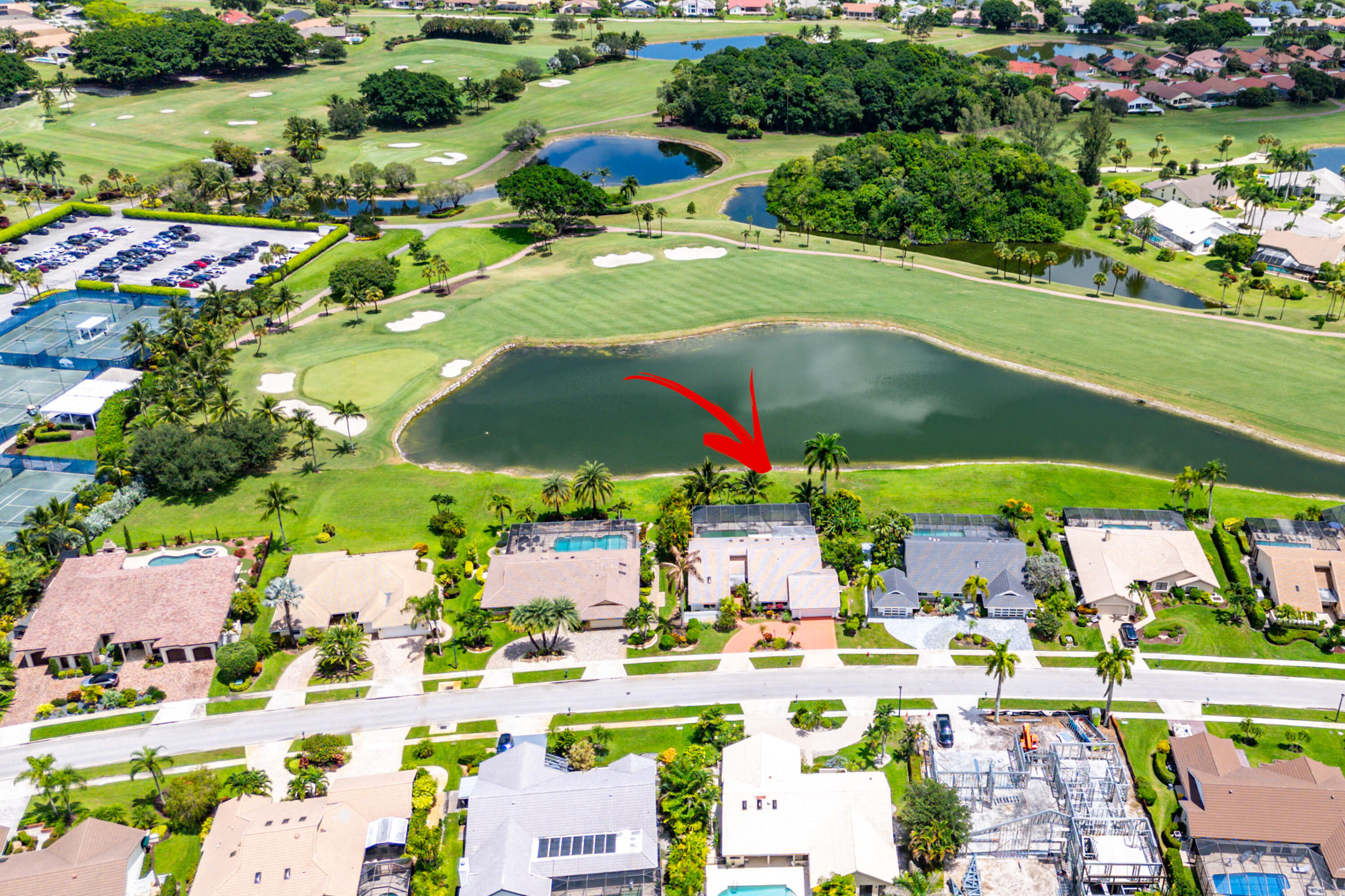 10391 Boca Woods Lane Boca Raton, FL 33428 - Photo 41 of 60 a view of swimming pool with a yard and outdoor seating
