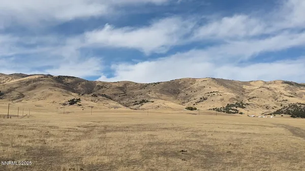 a view of mountain view with mountains in the background