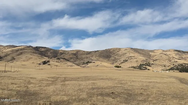a view of mountain view with mountains in the background