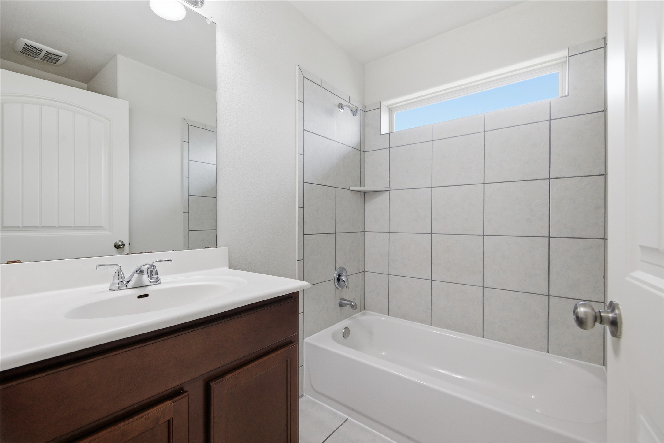 19325 Stokes Lane Pflugerville, TX 78660 - Photo 21 of 24 Full bath featuring vanity and shower / bath combination