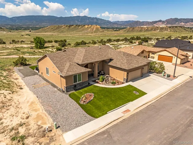 swimming pool view with a lake view